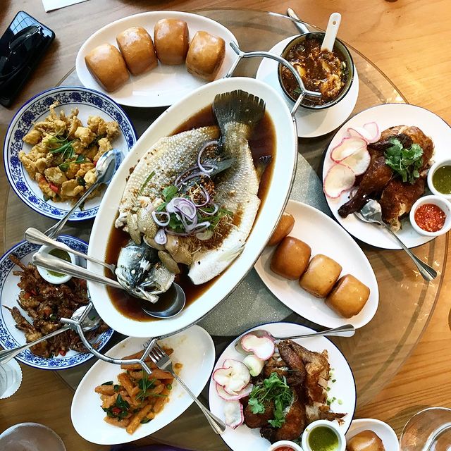 variety of restaurant dishes served on a table