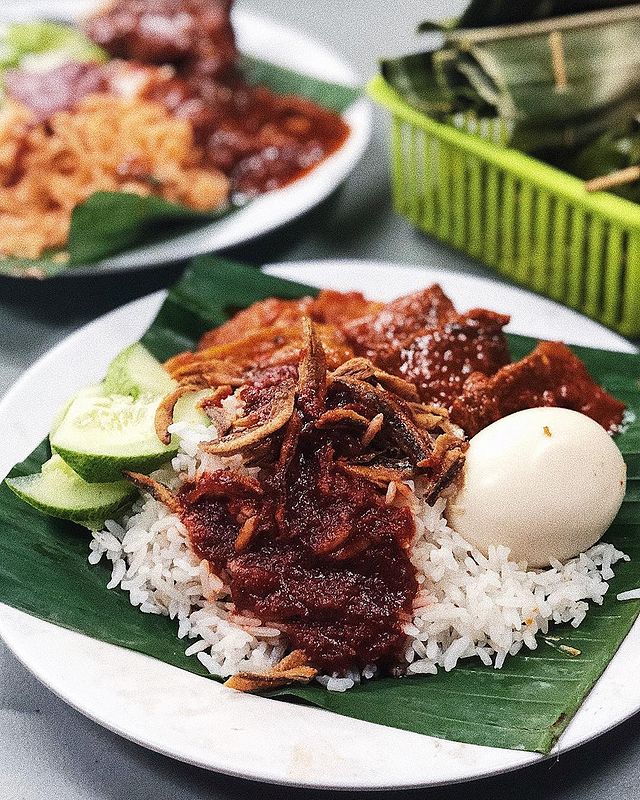 nasi lemak with fried anchovies, fresh cucumber, hard-boiled egg and sambal