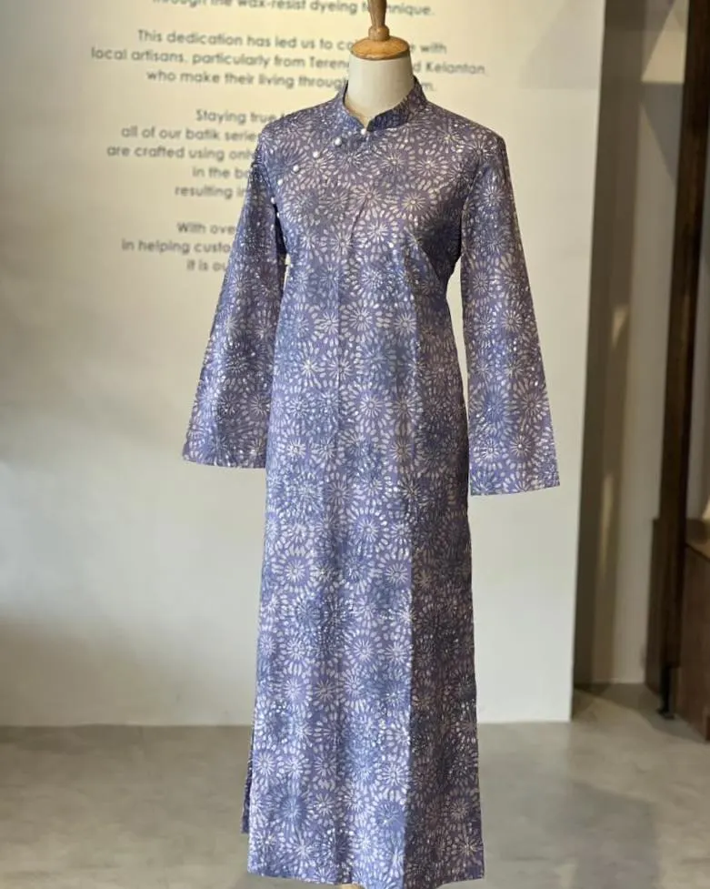 Blue batik design dressed on a headless mannequin
