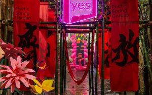 Chinese New Year decoration with flowers and calligraphy