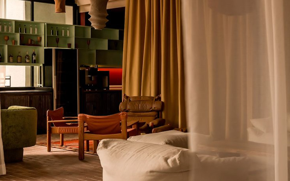 a hotel room with sofas