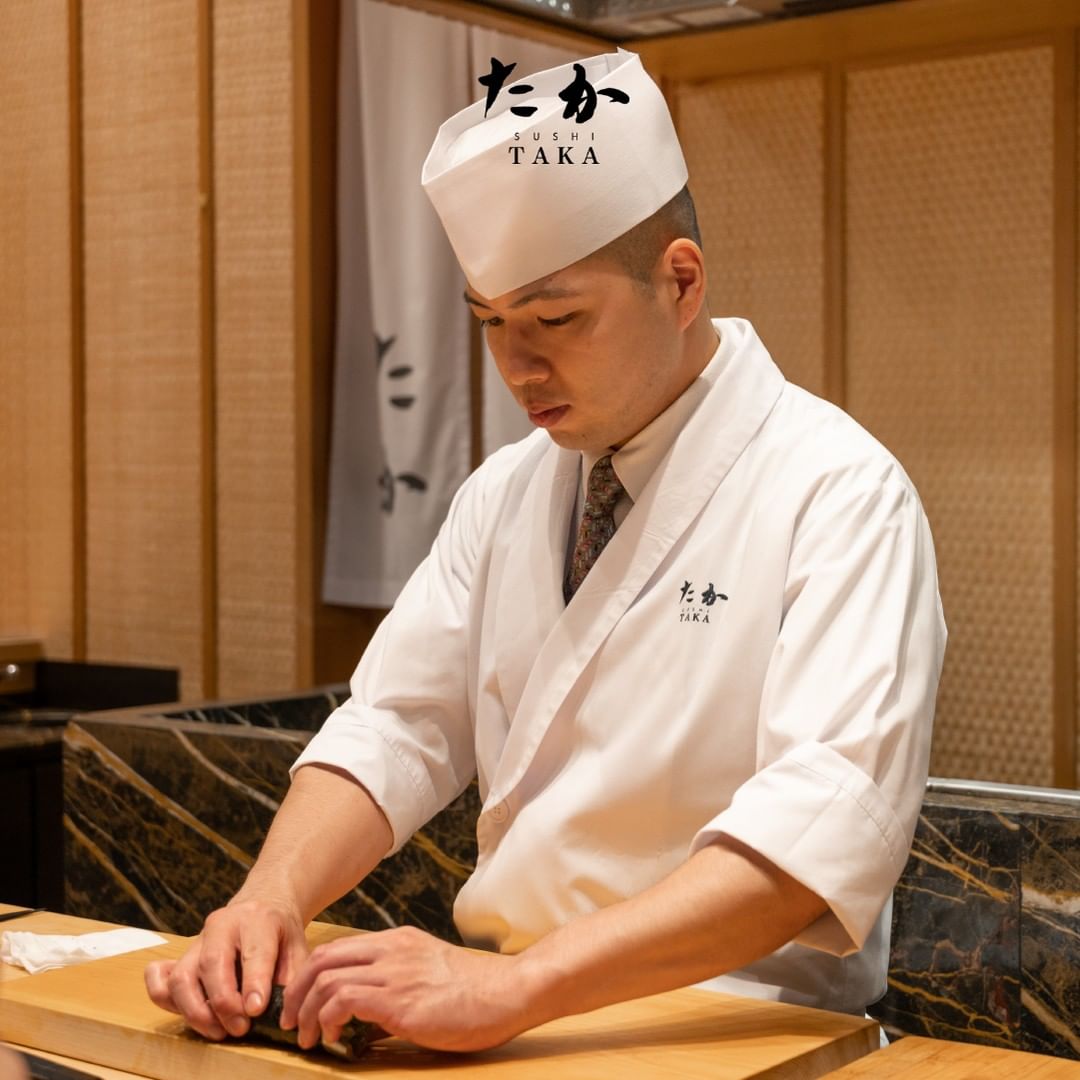 a professional Japanese chef making sushi
