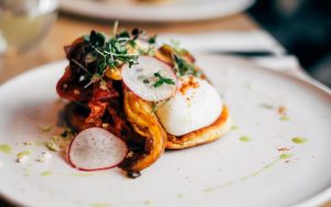 a fine dine food served on a plate