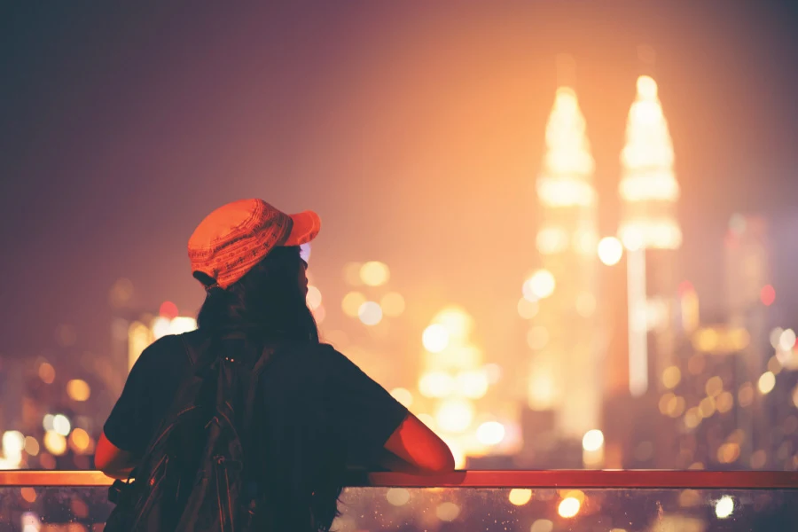 Solo traveling enjoying the night view of Kuala Lumpur