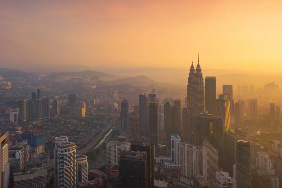 aerial view of a city of skyscrapers during the golden hour