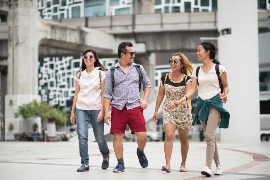 a group of friends walking in a city