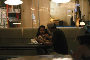 young couple sitting and dining at a restaurant