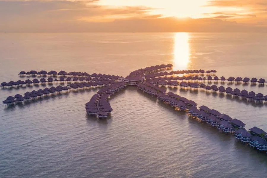 hotel resorts room built on the sea like the shape of a palm tree