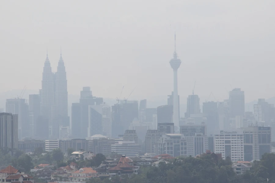 hazy city skyline with skyscrapers and buildings