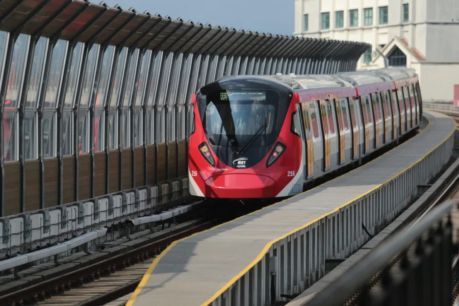 MRT on the tracks in a city