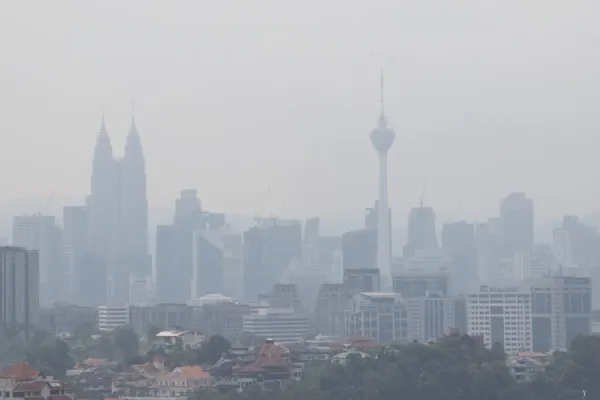 hazy city skyline with skyscrapers and buildings